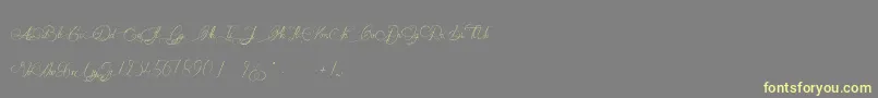 MademoiselleCatherine-Schriftart – Gelbe Schriften auf grauem Hintergrund