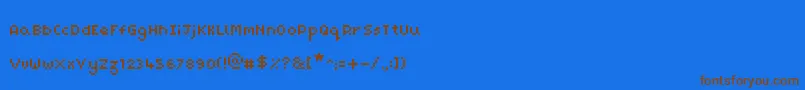 Czcionka PixelMaz – brązowe czcionki na niebieskim tle