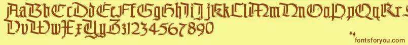 フォントTheEnd – 茶色の文字が黄色の背景にあります。