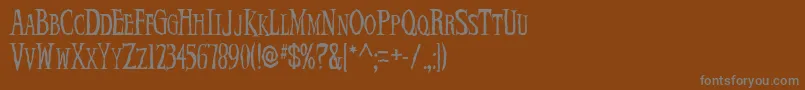 フォントDemonNight – 茶色の背景に灰色の文字