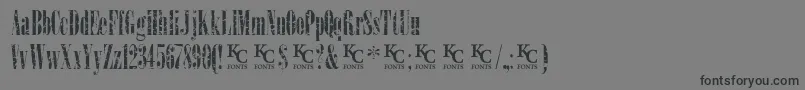 LoadupongunsKcfontsdemo Font – Black Fonts on Gray Background