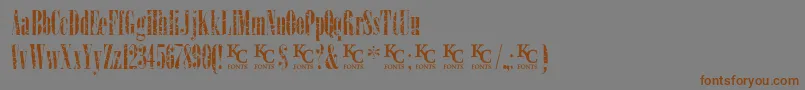 Шрифт LoadupongunsKcfontsdemo – коричневые шрифты на сером фоне