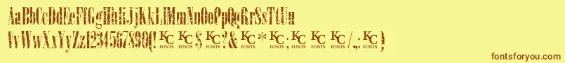 フォントLoadupongunsKcfontsdemo – 茶色の文字が黄色の背景にあります。