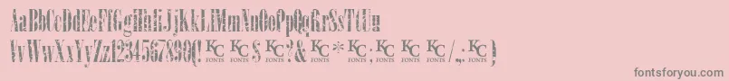 fuente LoadupongunsKcfontsdemo – Fuentes Grises Sobre Fondo Rosa