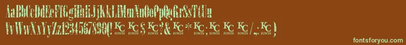 フォントLoadupongunsKcfontsdemo – 緑色の文字が茶色の背景にあります。