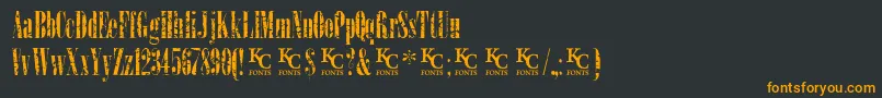 LoadupongunsKcfontsdemo Font – Orange Fonts on Black Background