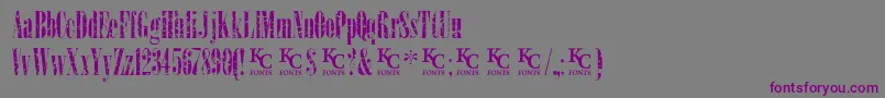 Шрифт LoadupongunsKcfontsdemo – фиолетовые шрифты на сером фоне