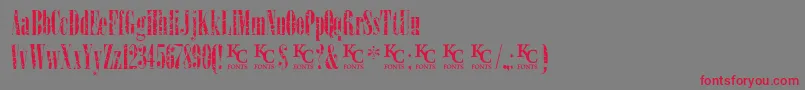 LoadupongunsKcfontsdemo-fontti – punaiset fontit harmaalla taustalla