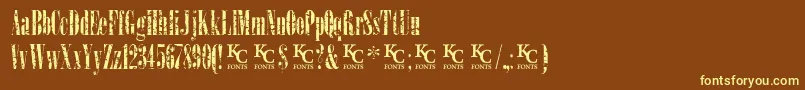 LoadupongunsKcfontsdemo-fontti – keltaiset fontit ruskealla taustalla