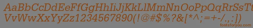 フォントGlyphaltstdOblique – 茶色の文字が灰色の背景にあります。