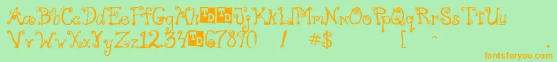 FreakTrialVersion-Schriftart – Orangefarbene Schriften auf grünem Hintergrund