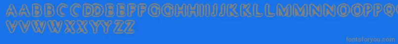 フォントMisterHaddaris – 青い背景に灰色の文字