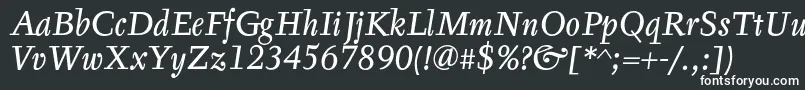 TyfaTextOtItalic-fontti – valkoiset fontit mustalla taustalla