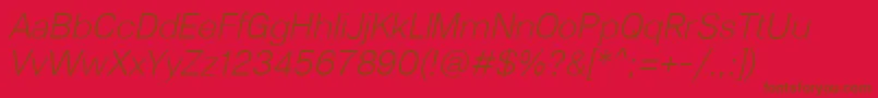 フォントLunchtype23LightItalic – 赤い背景に茶色の文字