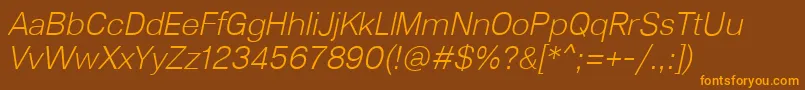 Fonte Lunchtype23LightItalic – fontes laranjas em um fundo marrom
