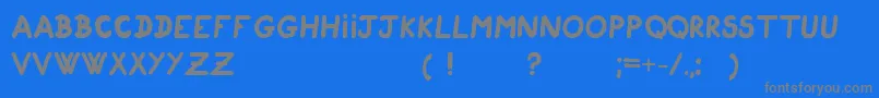 CigogneauTypoEnEn-fontti – harmaat kirjasimet sinisellä taustalla