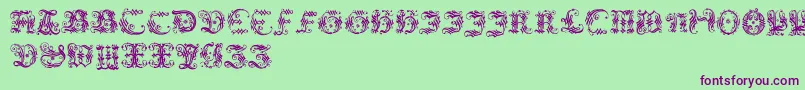 Ornamentalinitial-fontti – violetit fontit vihreällä taustalla