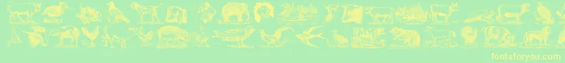 AnimalsOldCuts Font – Yellow Fonts on Green Background