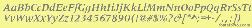 MetaphorBolditalic-Schriftart – Graue Schriften auf gelbem Hintergrund