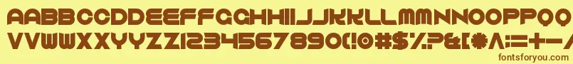 フォントComfortablyFucked – 茶色の文字が黄色の背景にあります。