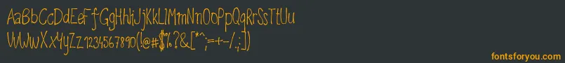 Upirpaw Font – Orange Fonts on Black Background