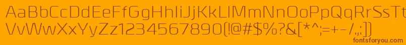 Więcej informacji o czcionce MetrikRegular Czcionka MetrikRegular – brązowe czcionki na pomarańczowym tle