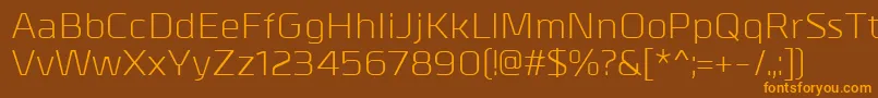 MetrikRegular Font – Orange Fonts on Brown Background