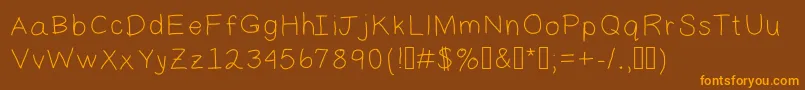 フォントDaddy2 – オレンジ色の文字が茶色の背景にあります。