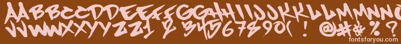 Czcionka Humanrase – różowe czcionki na brązowym tle