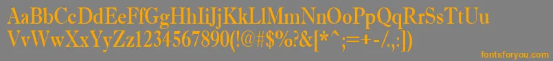 AAntiquetradynr-Schriftart – Orangefarbene Schriften auf grauem Hintergrund