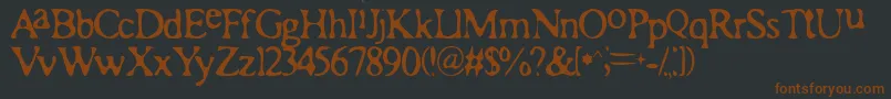 Romaa-fontti – ruskeat fontit mustalla taustalla