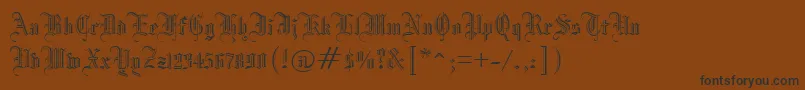 フォントManuscriptOpenRegular – 黒い文字が茶色の背景にあります