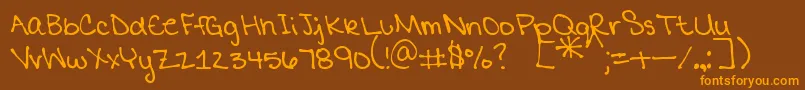 MtfMikaylaPrint Font – Orange Fonts on Brown Background