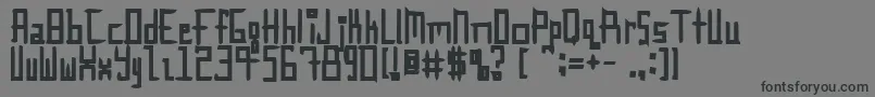InnieOuttie-Schriftart – Schwarze Schriften auf grauem Hintergrund