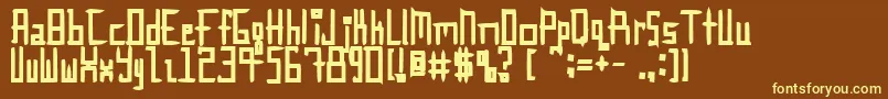 InnieOuttie-fontti – keltaiset fontit ruskealla taustalla
