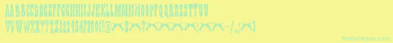 DkWildBunch-Schriftart – Grüne Schriften auf gelbem Hintergrund