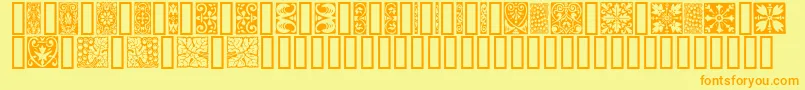 フォントOrna3 – オレンジの文字が黄色の背景にあります。