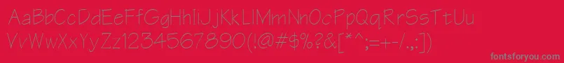 フォントArmacn – 赤い背景に灰色の文字