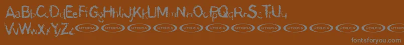 フォントDemon – 茶色の背景に灰色の文字