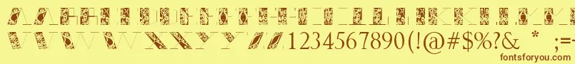 フォントThrigt – 茶色の文字が黄色の背景にあります。