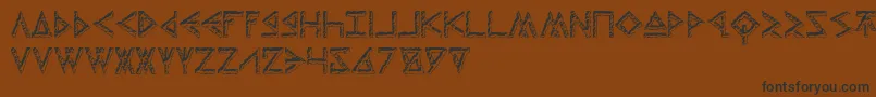 Czcionka ThorsHammerCarved – czarne czcionki na brązowym tle