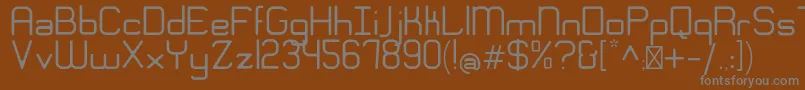 フォントEngadiGentle – 茶色の背景に灰色の文字