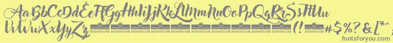 AdleryTrial-fontti – harmaat kirjasimet keltaisella taustalla