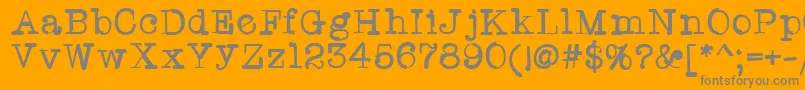 Twriterone-Schriftart – Graue Schriften auf orangefarbenem Hintergrund