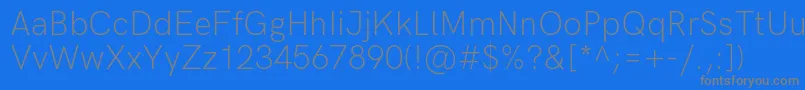 フォントHkgroteskLight – 青い背景に灰色の文字