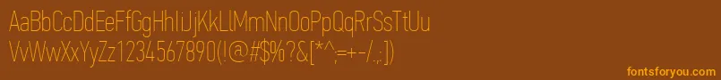 フォントPfdintextcompproXthin – オレンジ色の文字が茶色の背景にあります。