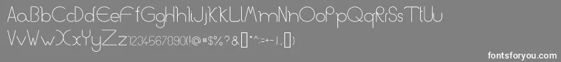 フォントCurvy – 灰色の背景に白い文字