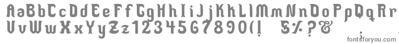 フォントMedusaScript – 白い背景に灰色の文字