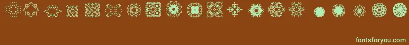 Ladoodles2-fontti – vihreät fontit ruskealla taustalla