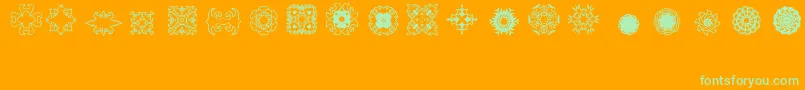 Ladoodles2-Schriftart – Grüne Schriften auf orangefarbenem Hintergrund